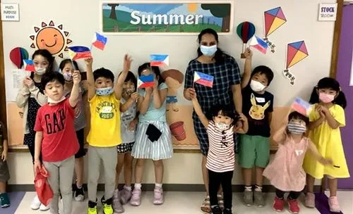 Confident child smiling during a school activity