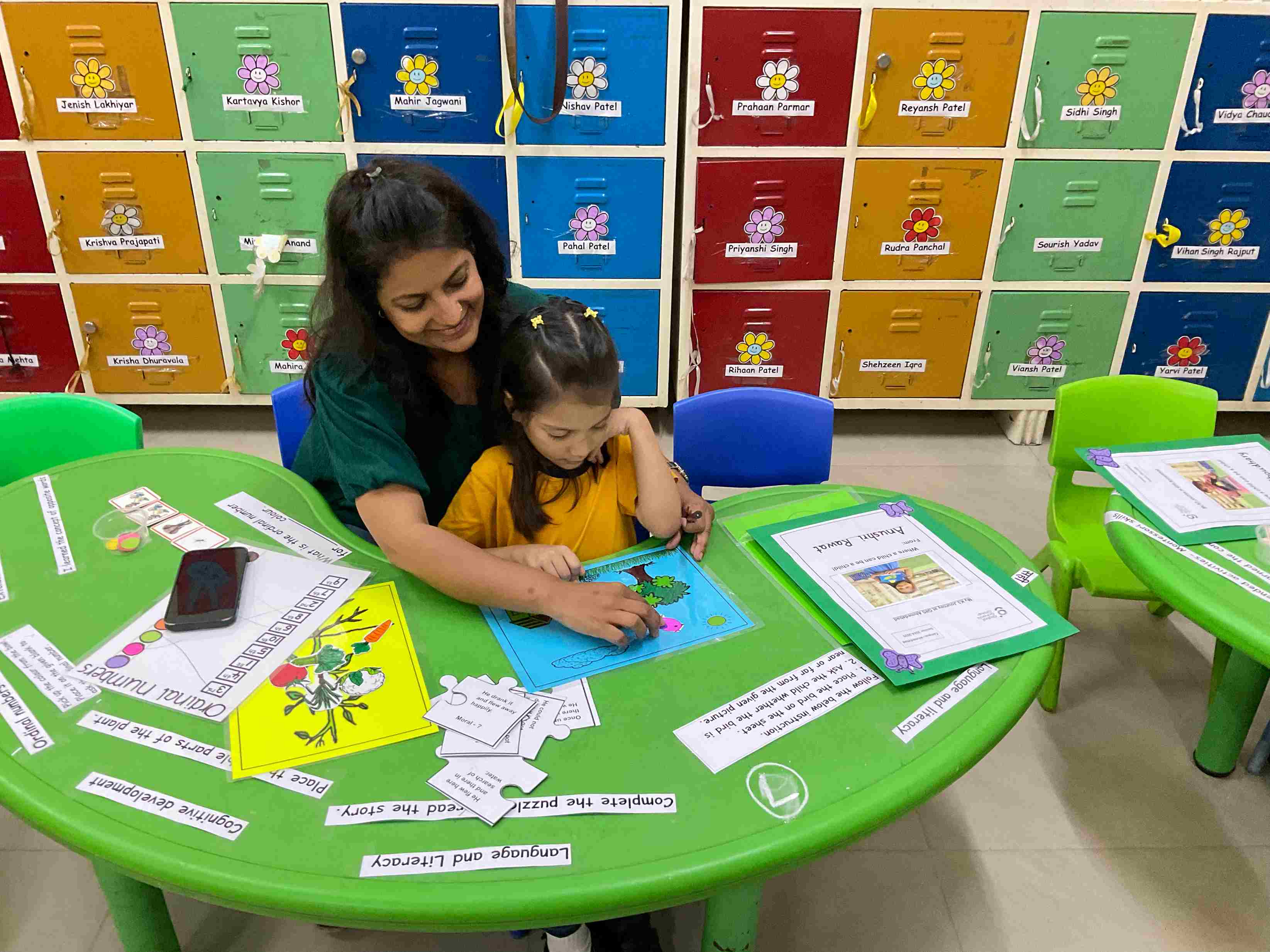 Teacher guiding students in a classroom activity focused on social-emotional learning and student development