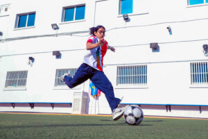 Student playing football
