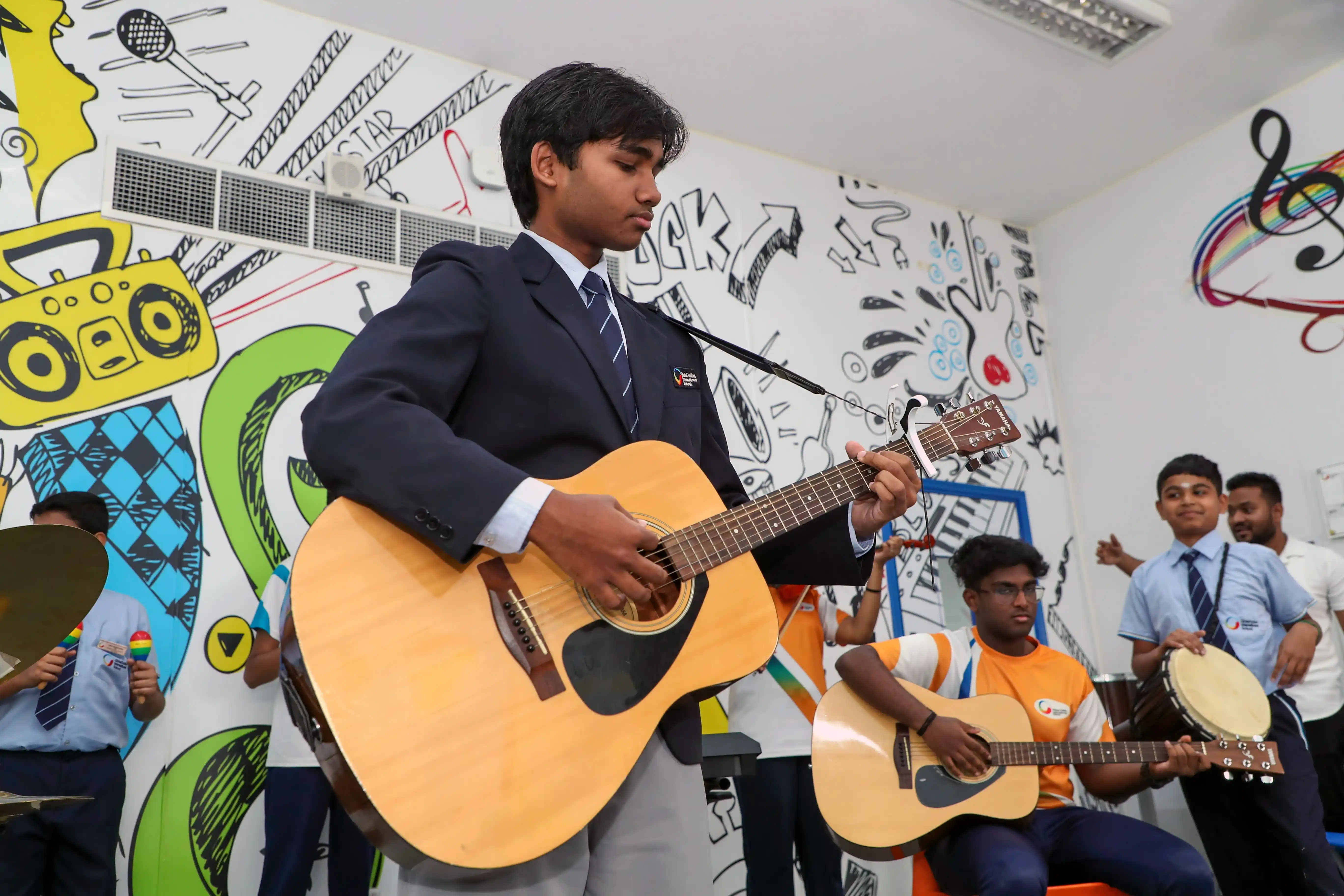 Student and his guitar
