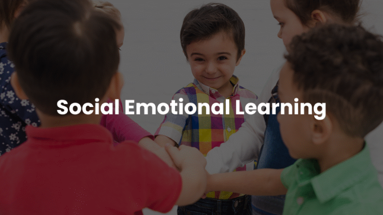 Teacher guiding students in a classroom activity focused on social-emotional learning and student development