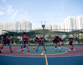 Students playing basketball