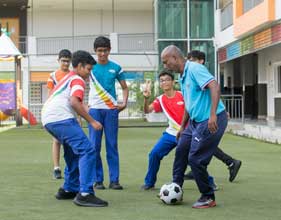 students playing soccer