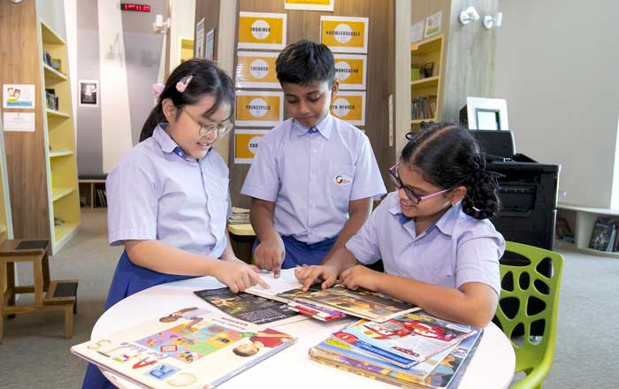 Students engaged in reading activities at school